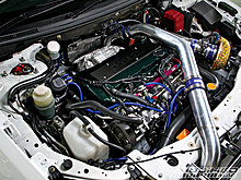 modp_0908_04_o-hks_cz200s_mitsubishi_lancer_evo_x-engine_bay.jpg