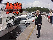 normal_car-crashes-into-boat-weird-crash-pictures.jpg