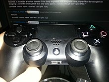 dualshock_4_worn.jpg