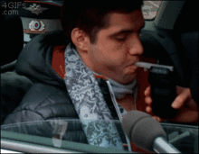 breathalyzer-cigarette-toss.gif