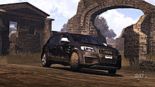 30924dirty-black-audi-suv-front-right-view-stone-structures.jpg