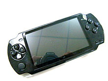 pxp-900-chinese-psp-clone-plays-any-portable-game-2.jpg